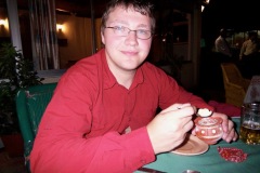 Andy enjoys his ice cream, a poor substitute for a tiger.
