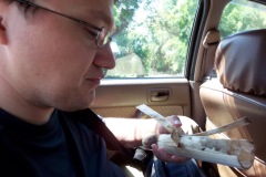 Andy considers lunch! Sticky rice in bamboo.